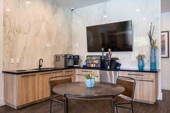 Beverage station with complimentary coffee, tea and hot cocoa